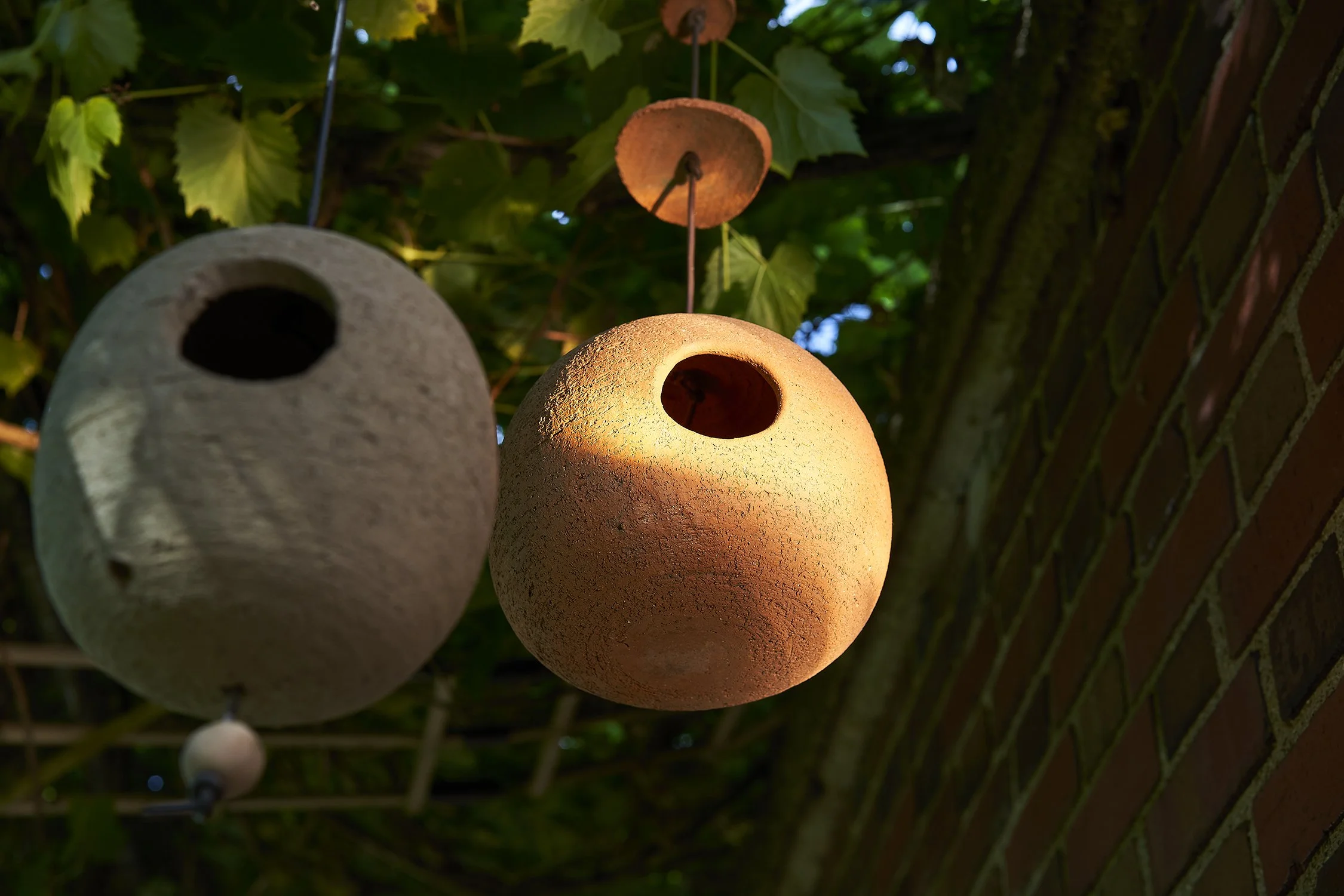Signed Stan Bitters round earthenware birdhouse with two entrances